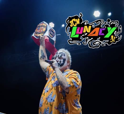 Violent J holding up the JCW belt