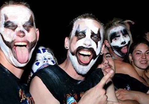 Juggalos at a Gathering event, wearing face paint inspired by Insane Clown Posse’s iconic designs.