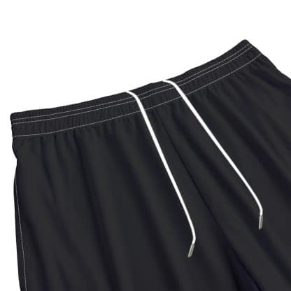 Close-Up of Creepboy Logo on Left Leg of Black Mesh Shorts