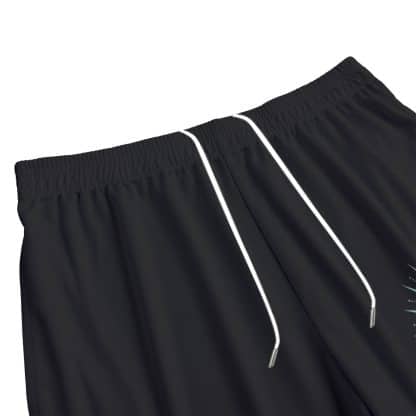 Close-Up of 55 Strong Drip Royale Logo on Left Leg of Black Mesh Shorts